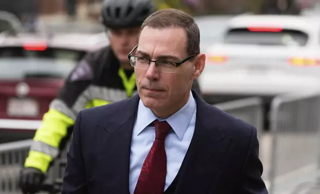 Prosecutor Hank Brennan arrives for the trial of Karen Read at Norfolk Superior Court, Tuesday, April 22, 2025, in Dedham, Mass. (AP Photo/Charles Krupa)
