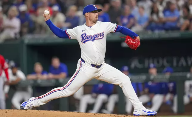 Texas Rangers pitcher Shawn Armstrong throws a pitch to the Los Angeles Angels during the sixth inning of a baseball game Wednesday, April 16, 2025, in Arlington, Texas. (AP Photo/Julio Cortez)