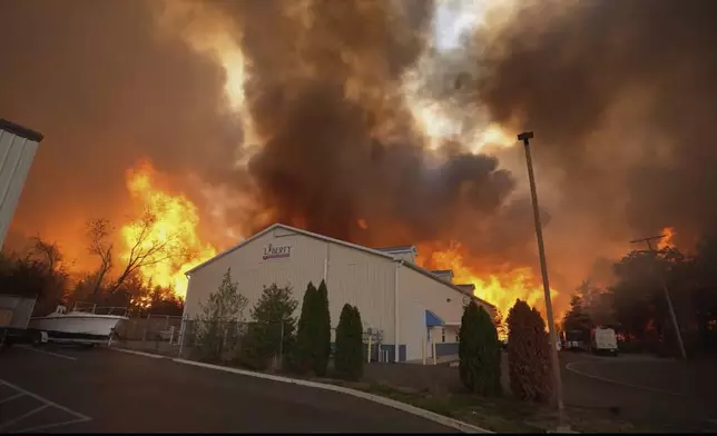 Smoke fills the sky from a wildfire in Lacey Townships, N.J. on Tuesday, April 22, 2025. (New Jersey Department of Environmental Protection via AP)