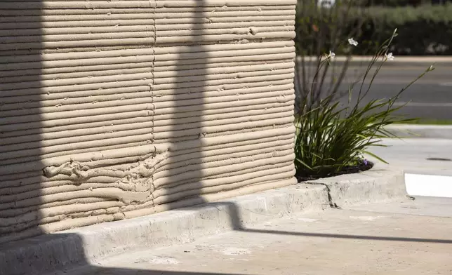 A view of the exterior shows a 3D printed Starbucks building Monday, April 28, 2025, in Brownsville, Texas. (AP Photo/Michael Gonzalez)