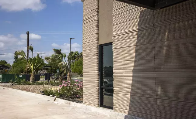 A view of the exterior shows a 3D printed Starbucks building Monday, April 28, 2025, in Brownsville, Texas. (AP Photo/Michael Gonzalez)