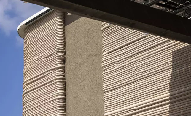 A view of the exterior shows a 3D printed Starbucks building Monday, April 28, 2025, in Brownsville, Texas. (AP Photo/Michael Gonzalez)