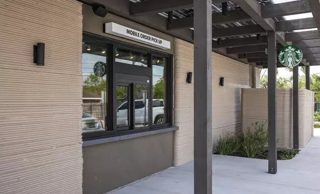 A view of the exterior shows a 3D printed Starbucks building Monday, April 28, 2025, in Brownsville, Texas. (AP Photo/Michael Gonzalez)