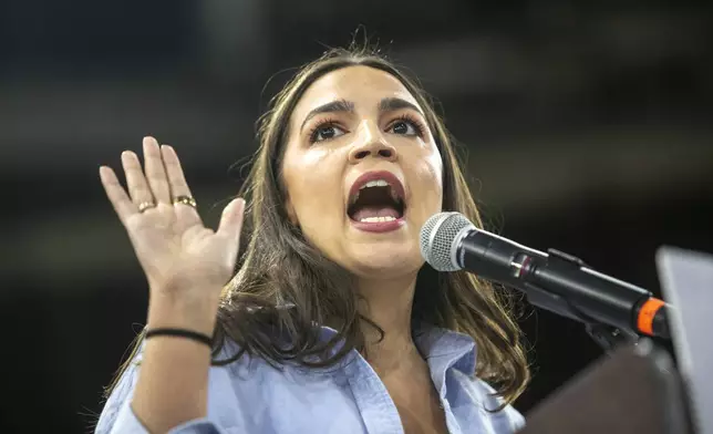 Rep. Alexandra Ocasio-Cortez, D-N.Y., speaks during a "Fighting Oligarchy" event at the Ford Idaho Center in Nampa, Idaho, Monday, April 14, 2025. (AP Photo/Kyle Green)