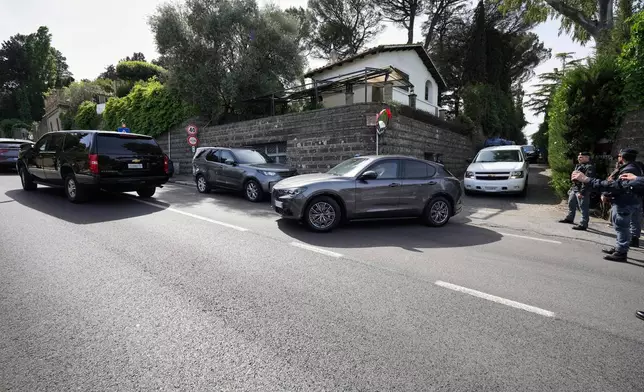 U.S. delegates leave the Omani Embassy in Rome after closed-door meeting with an Iranian delegation to discuss Tehran's rapidly advancing nuclear program, Saturday, April 19, 2025. (AP Photo/Andrew Medichini)