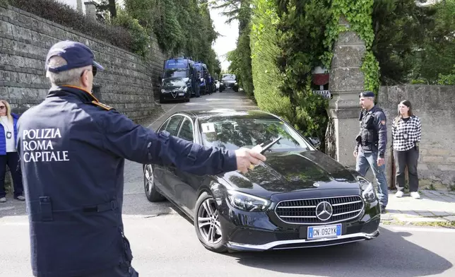 Iranian delegates leave the Omani Embassy in Rome after closed-door meeting with a U.S. delegation to discuss Tehran's rapidly advancing nuclear program, Saturday, April 19, 2025. (AP Photo/Andrew Medichini)