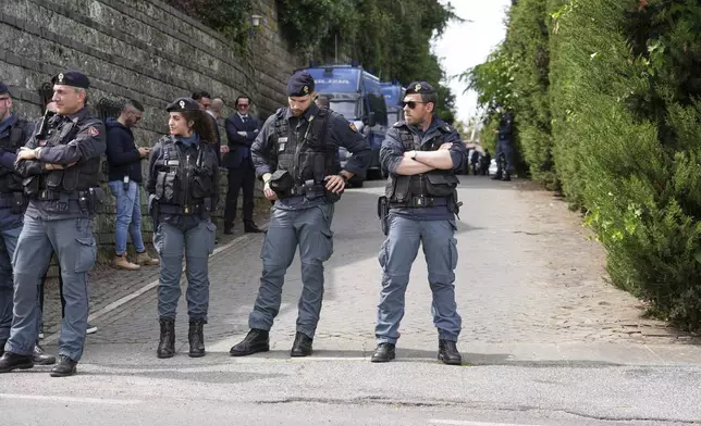 Police patrol outside theOmani Embassy in Rome during a closed-door meeting between U.S. and Iranian delegations to discuss Tehran's rapidly advancing nuclear program, Saturday, April 19, 2025. (AP Photo/Andrew Medichini)