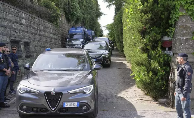 Iranian delegates leave the Omani Embassy in Rome after closed-door meeting with a U.S. delegation to discuss Tehran's rapidly advancing nuclear program, Saturday, April 19, 2025. (AP Photo/Andrew Medichini)