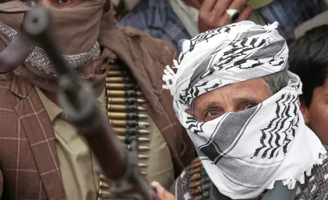 Houthi supporters chant slogans during an anti-U.S. and anti-Israel rally in Sanaa, Yemen, Friday, April 18, 2025. (AP Photo/Osamah Abdulrahman)