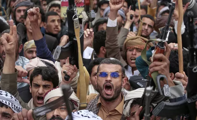 Houthi supporters chant slogans during an anti-U.S. and anti-Israel rally in Sanaa, Yemen, Friday, April 18, 2025. (AP Photo/Osamah Abdulrahman)