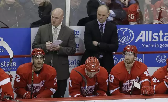 FILE - Detroit Red Wings assistant coach Pat Ferschweiler, left, and head coach Jeff Blashill watch during the third period of an NHL hockey game against the Colorado Avalanche, Friday, Feb. 12, 2016, in Detroit. (AP Photo/Carlos Osorio, File)