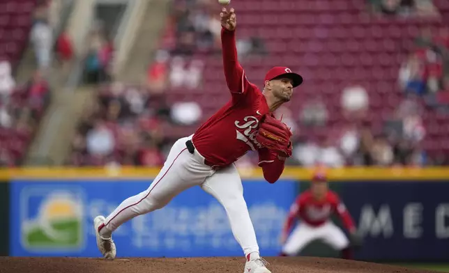 Cincinnati Reds pitcher Nick Martinez throws in the first inning of a baseball game against the Seattle Mariners, Wednesday, April 16, 2025, in Cincinnati. (AP Photo/Carolyn Kaster)