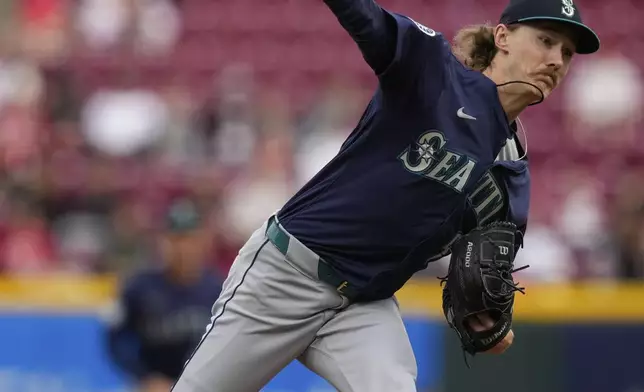 Seattle Mariners pitcher Bryce Miller throws in the first inning of a baseball game against the Cincinnati Reds, Wednesday, April 16, 2025, in Cincinnati. (AP Photo/Carolyn Kaster)
