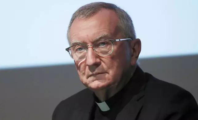FILE - Cardinal Pietro Parolin attends at the 150th anniversary of the arrival of Catholic missionaries in China from an Italian religious order meeting, in Milan, Italy, on Oct. 3, 2020. (AP Photo/Antonio Calanni)