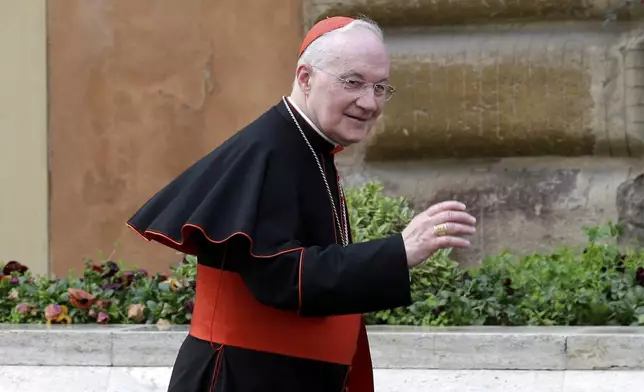 FILE - Cardinal Marc Ouellet arrives for a meeting at the Vatican on March 11, 2013. (AP Photo/Alessandra Tarantino, File)