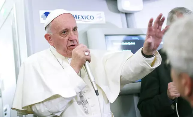 FILE - Pope Francis speaks to journalists aboard the plane during the flight from Ciudad Juarez, Mexico to Rome, where he suggested that women threatened with the Zika virus could use artificial contraception but not abort their fetus, Wednesday, Feb. 17, 2016. (Alessandro Di Meo/Pool Photo via AP, File)