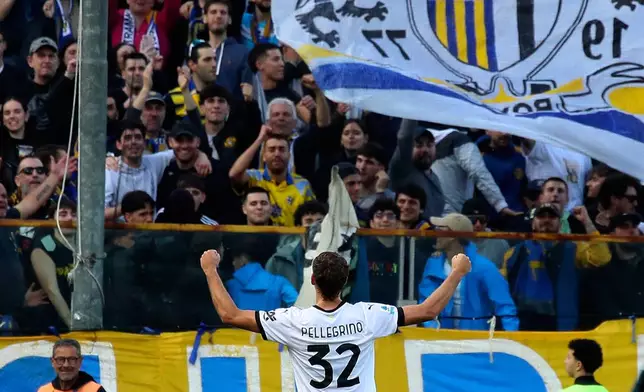 Parma's Mateo Pellegrino celebrates scoring with the fans during the Serie A soccer match between Parma and Juventus at the Ennio Tardini Stadium, Italy, Wednesday April 23, 2025. (Paola Garbuio/LaPresse via AP)