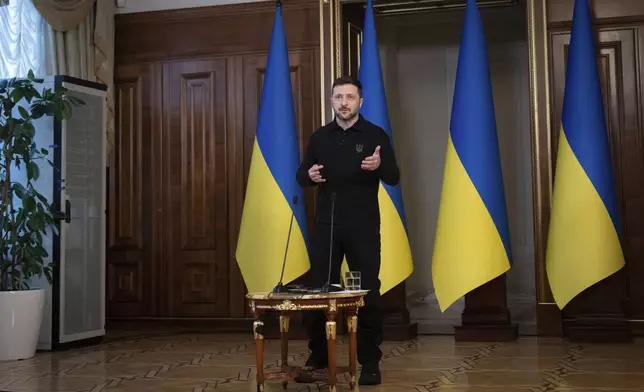 Ukrainian President Volodymyr Zelenskyy speaks during a briefing in Kyiv, Ukraine, Thursday, April 17, 2025. (AP Photo/Efrem Lukatsky)