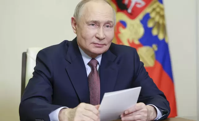 Russian President Vladimir Putin chairs a meeting on economic issues via videoconference at Novo-Ogaryovo state residence outside of Moscow, Russia, Thursday, April 24, 2025. (Vyacheslav Prokofyev, Sputnik, Kremlin Pool Photo via AP)