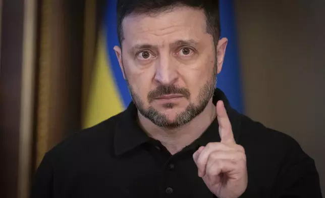 Ukrainian President Volodymyr Zelenskyy speaks during a briefing in Kyiv, Ukraine, Thursday, April 17, 2025. (AP Photo/Efrem Lukatsky)