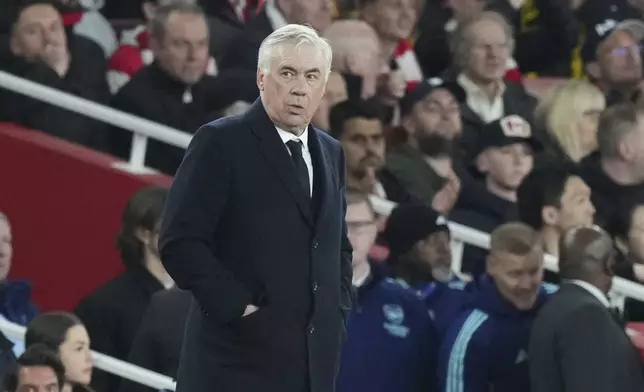 Real Madrid's head coach Carlo Ancelotti reacts during the Champions League quarterfinal first leg soccer match between Arsenal and Real Madrid at the Emirates Stadium in London, Tuesday, April 8, 2025. (AP Photo/Frank Augstein)