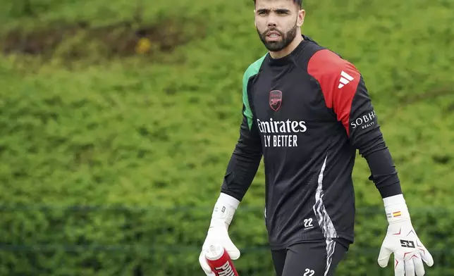 Arsenal's goalkeeper David Raya during a training session in London, England, Tuesday, April 15, 2025, ahead of the Champions League soccer match between Real Madrid and Arsenal London. (Jonathan Brady/PA via AP)