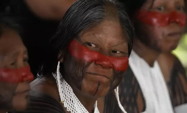 Kayapo Indigenous women attend the Free Earth camp held annually to demand more government attention to Indigenous issues in Brasilia, Brazil, Monday, April 7, 2025. (AP Photo/Eraldo Peres)