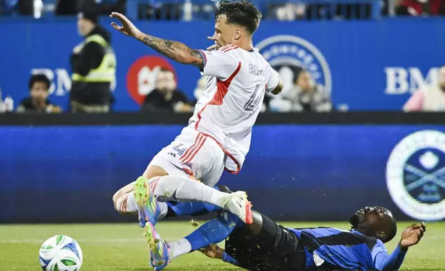 Orlando City's David Brekalo (4) challenges CF Montreal's Prince Owusu (9) during first half MLS soccer action in Montreal, Saturday, April 19, 2025. (Graham Hughes/The Canadian Press via AP)