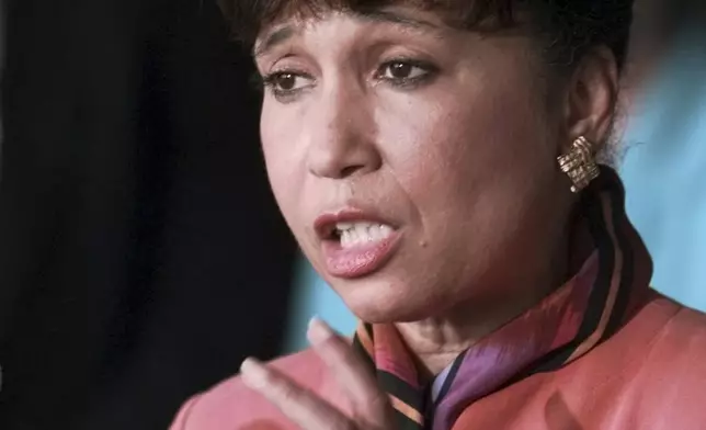 Labor Secretary Alexis Herman meets reporters at the Labor Department in Washington Tuesday, July 28, 1998, to discuss General Motors Corporation's tentative agreement with the United Auto Workers. The agreement would end an almost two-month strike that virtually shut down GM's North American production costing the number one automaker $2.2 billion. (AP Photo/Steve Helber)