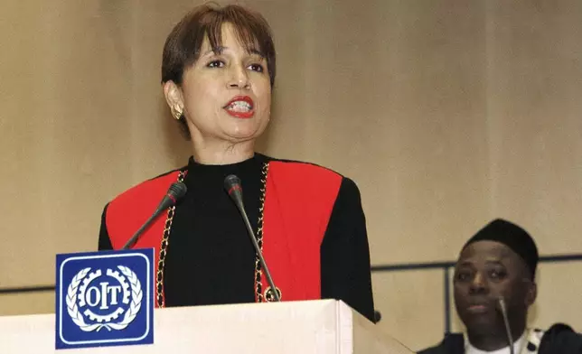 FILE - Alexis Herman, U.S. Secretary of Labor, addresses the 87th Annual International Labor Conference in Geneva, Switzerland, June 15, 1999. (AP Photo/Donald Stampfli, file)