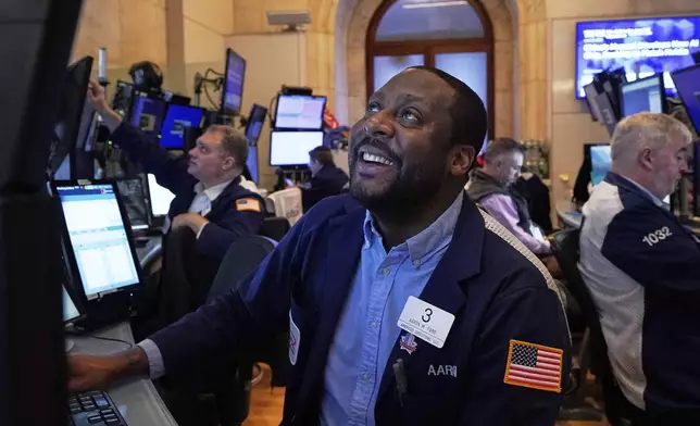 Trader Aaron Ford works on the floor of the New York Stock Exchange, Monday, April 28, 2025. (AP Photo/Richard Drew)