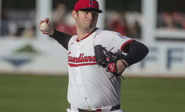 Cleveland Guardians starting pitcher Gavin Williams delivers against the New York Yankees during the first inning of a baseball game in Cleveland, Monday, April 21, 2025. (AP Photo/Phil Long)