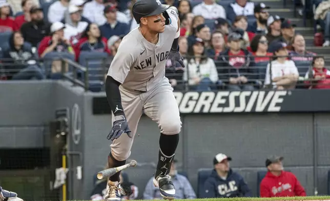 New York Yankees' Aaron Judge watches his double off Cleveland Guardians starting pitcher Gavin Williams during the third inning of a baseball game in Cleveland, Monday, April 21, 2025. (AP Photo/Phil Long)