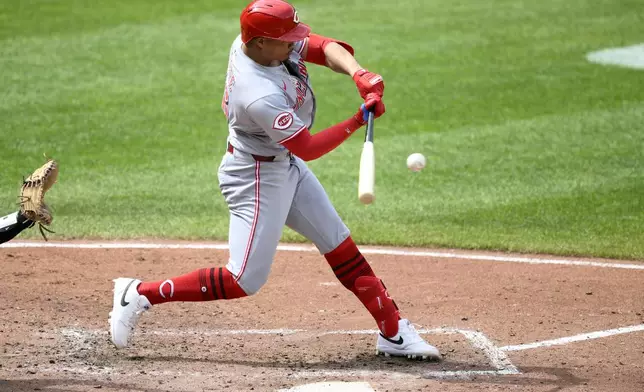 Cincinnati Reds' Noelvi Marte hits a RBI double during the fourth inning of a baseball game against the Baltimore Orioles, Sunday, April 20, 2025, in Baltimore. (AP Photo/Nick Wass)