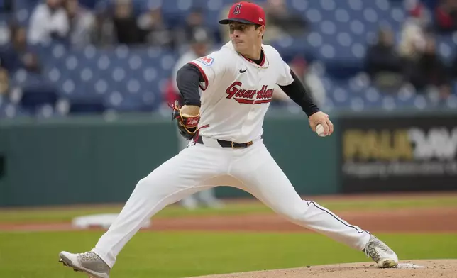 Cleveland Guardians' Logan Allen pitches in the first inning of a baseball game against the Chicago White Sox in Cleveland, Wednesday, April 9, 2025. (AP Photo/Sue Ogrocki)