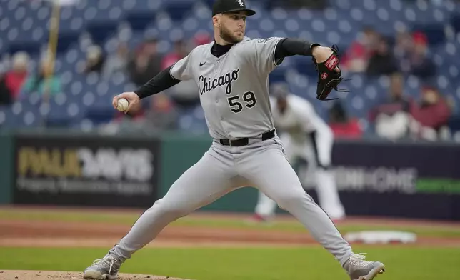 Chicago White Sox's Sean Burke pitches in the first inning of a baseball game against the Cleveland Guardians in Cleveland, Wednesday, April 9, 2025. (AP Photo/Sue Ogrocki)