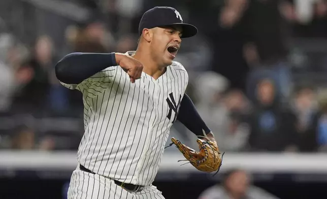 New York Yankees pitcher Fernando Cruz celebrates after a baseball game against the Kansas City Royals Wednesday, April 16, 2025, in New York. (AP Photo/Frank Franklin II)