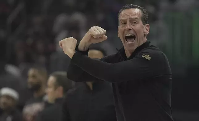 Cleveland Cavaliers head coach Kenny Atkinson shouts in the first half in Game 1 of an NBA first-round playoff series against the Miami Heat, Sunday, April 20, 2025, in Cleveland. (AP Photo/Sue Ogrocki)
