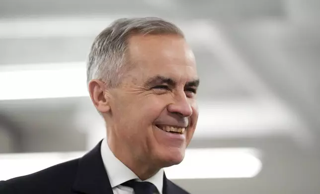 FILE - Canada Liberal Leader Mark Carney visits the Sheridan College Police Foundations department in Brampton, Ontario, Canada, April 10, 2025. (Sean Kilpatrick/The Canadian Press via AP, File)
