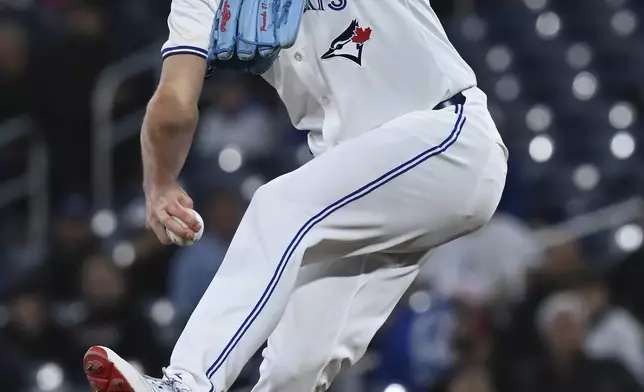 Toronto Blue Jays starting pitcher Chris Bassitt (40) throws to an Atlanta Braves batter in first inning baseball action in Toronto on Wednesday, April 16, 2025. (Jon Blacker/The Canadian Press via AP)