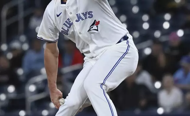 Toronto Blue Jays starting pitcher Chris Bassitt (40) throws to an Atlanta Braves batter in first inning baseball action in Toronto on Wednesday, April 16, 2025. (Jon Blacker/The Canadian Press via AP)