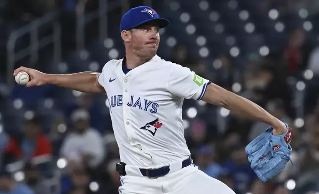 Toronto Blue Jays starting pitcher Chris Bassitt (40) throws to an Atlanta Braves batter in first inning baseball action in Toronto on Wednesday, April 16, 2025. (Jon Blacker/The Canadian Press via AP)