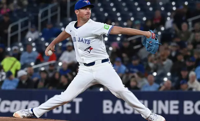 Toronto Blue Jays starting pitcher Chris Bassitt (40) throws to an Atlanta Braves batter in the first inning of an interleague baseball game in Toronto, Wednesday, April 16, 2025. (Jon Blacker/The Canadian Press via AP)