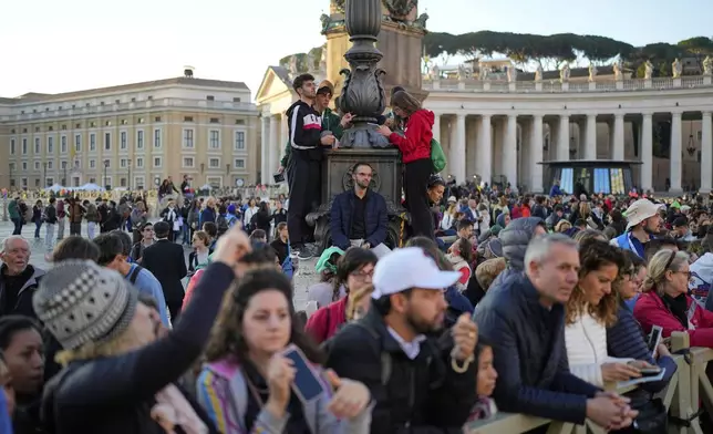 People fill St. Peter's Square ahead of the funeral of Pope Francis at the Vatican, Saturday, April 26, 2025. (AP Photo/Andreea Alexandru)