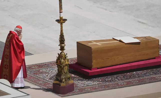 Dean of the College of Cardinals Giovanni Battista Re presides over the funeral of Pope Francis in St. Peter's Square at the Vatican, Saturday, April 26, 2025. (AP Photo/Gregorio Borgia)