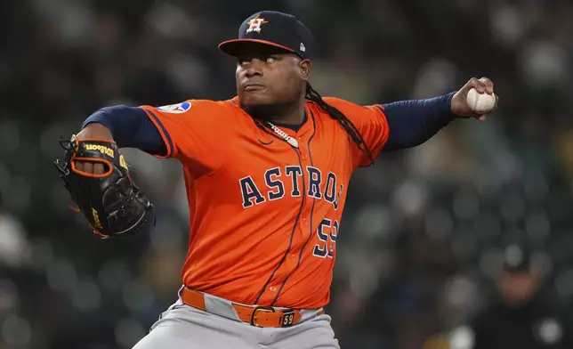 Houston Astros starting pitcher Framber Valdez throws against the Seattle Mariners during the fifth inning of a baseball game Tuesday, April 8, 2025, in Seattle. (AP Photo/Lindsey Wasson)