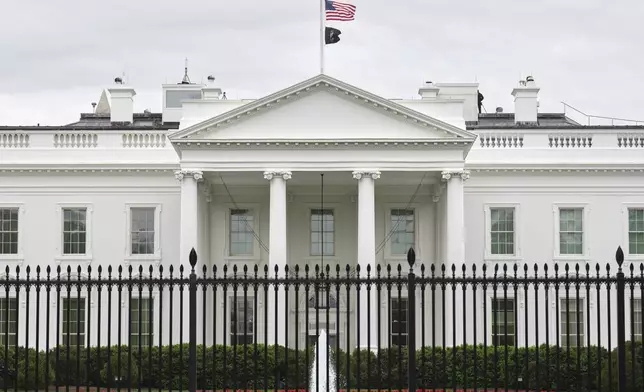 The U.S. flag is flown at half-staff at the White House in Washington in honor of Pope Francis, Monday, April 21, 2005. Pope Francis has died at age 88. (AP Photo/Jacquelyn Martin)