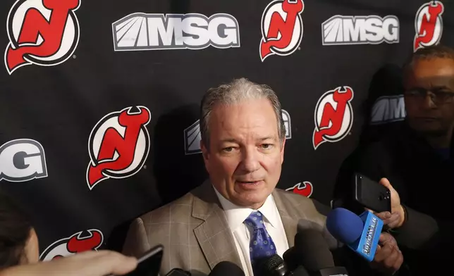 FILE - New Jersey Devils General Manager Ray Shero speaks to members of the media before an NHL hockey game against the Vegas Golden Knights, Tuesday, Dec. 3, 2019, in Newark, N.J. (AP Photo/Kathy Willens, file)