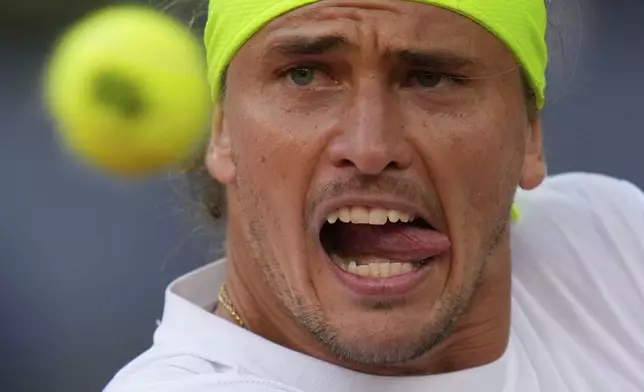 Alexander Zverev of Germany watches the ball against Juan Manuel Cerundolo of Argentina during the Madrid Open tennis tournament in Madrid, Spain, Tuesday, April 29, 2025. (AP Photo/Manu Fernandez)