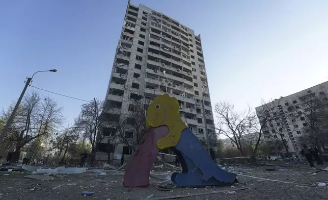 A residential building damaged by a Russian strike in Kharkiv, Ukraine, Friday April 18, 2025. (AP Photo/Andrii Marienko)